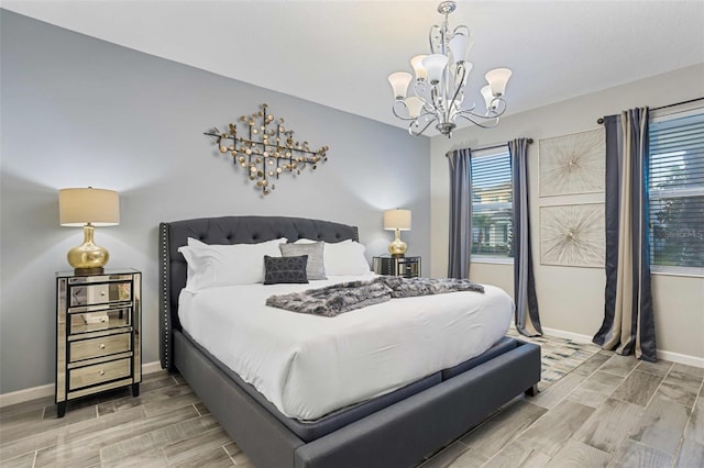 bedroom featuring an inviting chandelier