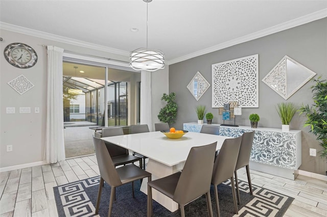 dining space featuring ornamental molding