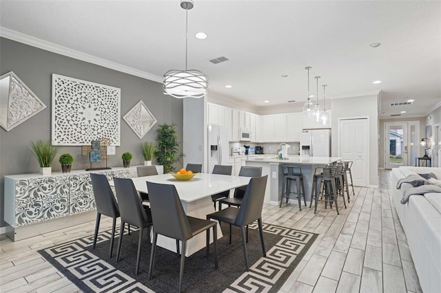 dining room with ornamental molding