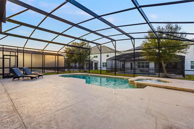 2628 Calistoga Ave, Kissimmee, FL 34741 - view of pool with a patio area, a pool with connected hot tub, and a lanai