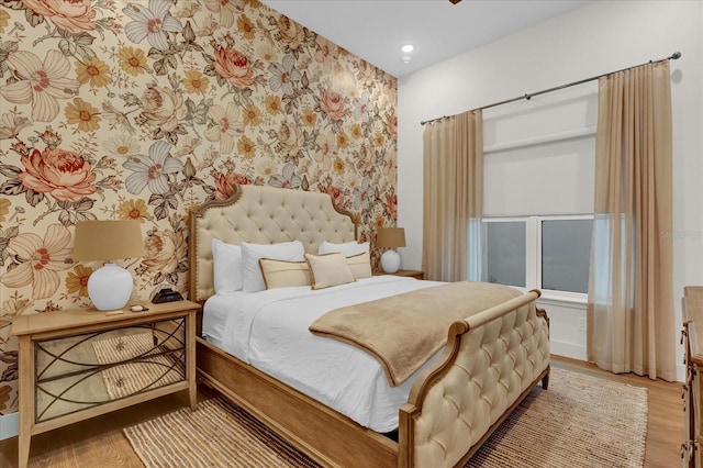 bedroom with wood-type flooring