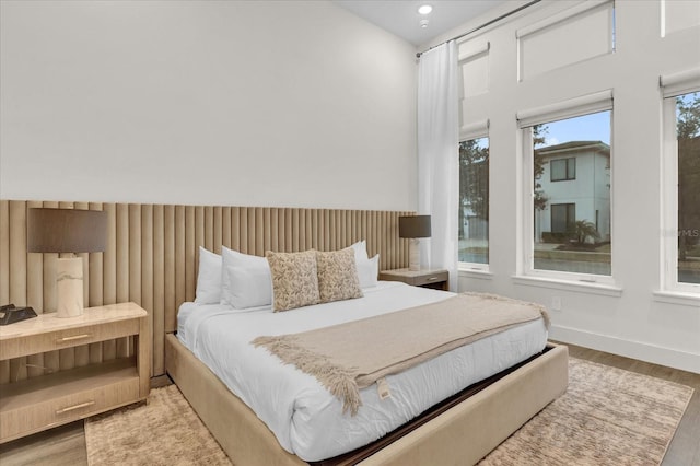 bedroom with light wood-type flooring