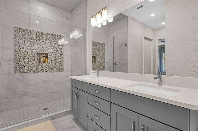 bathroom featuring vanity and walk in shower