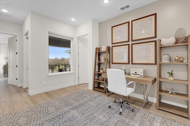 office area featuring light hardwood / wood-style floors