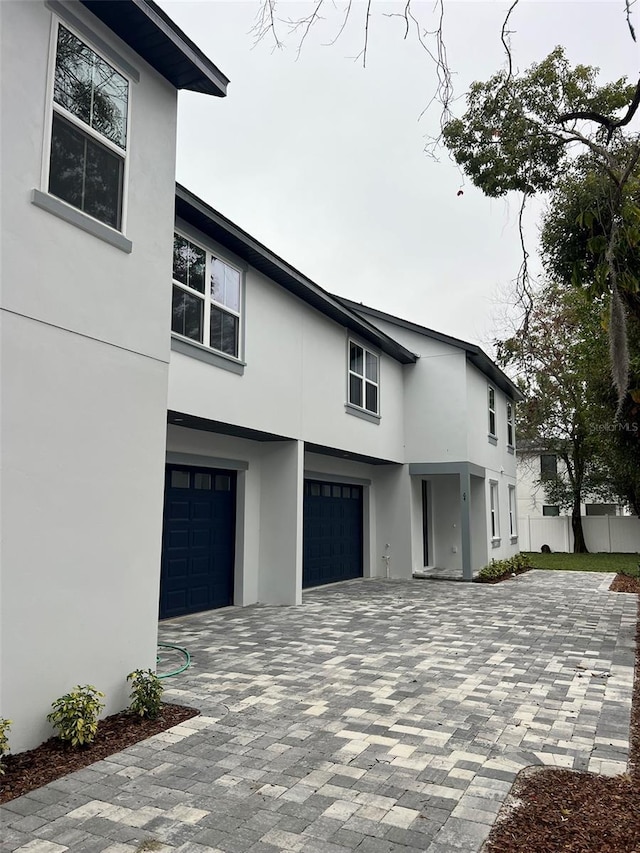 view of property exterior featuring a garage