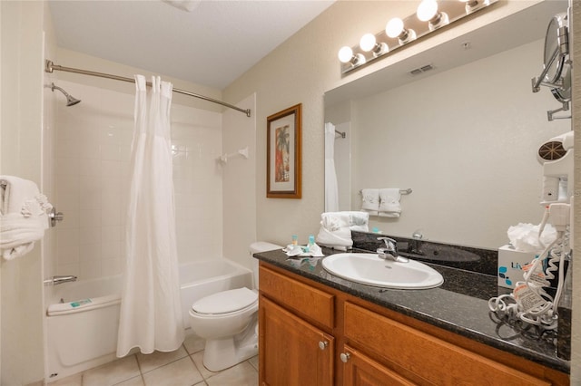 full bathroom with toilet, vanity, shower / bath combo, and tile patterned flooring