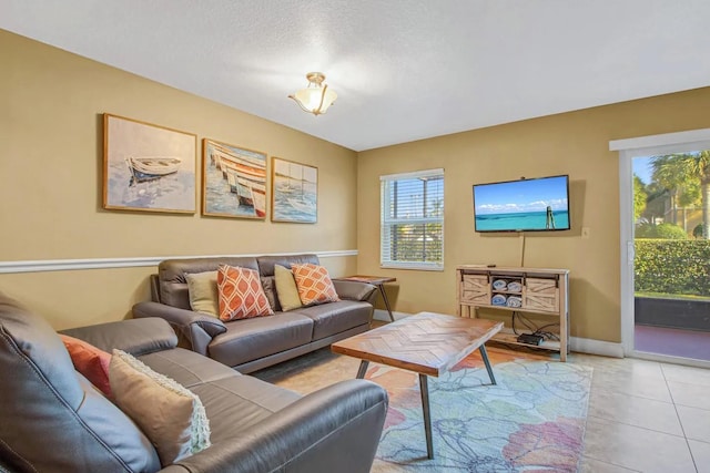 tiled living room with a textured ceiling