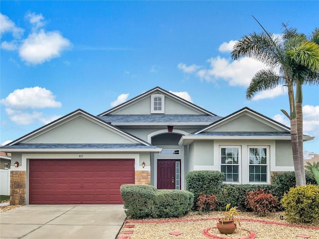 view of front of property with a garage