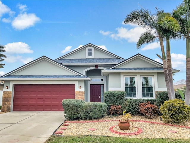 view of front of home with a garage