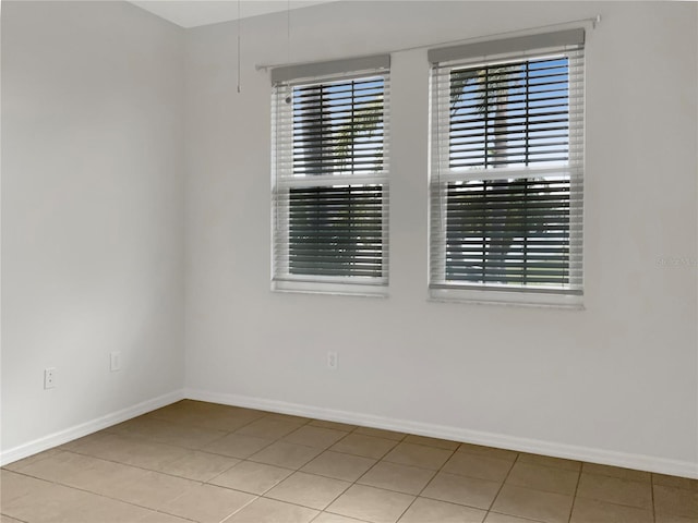 view of tiled spare room