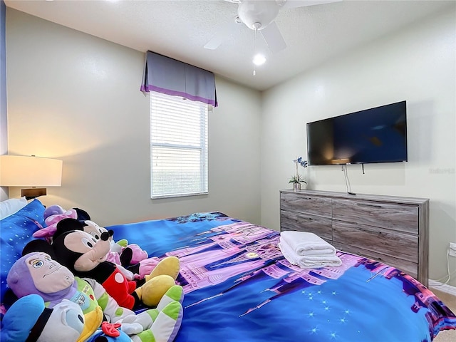 bedroom featuring ceiling fan