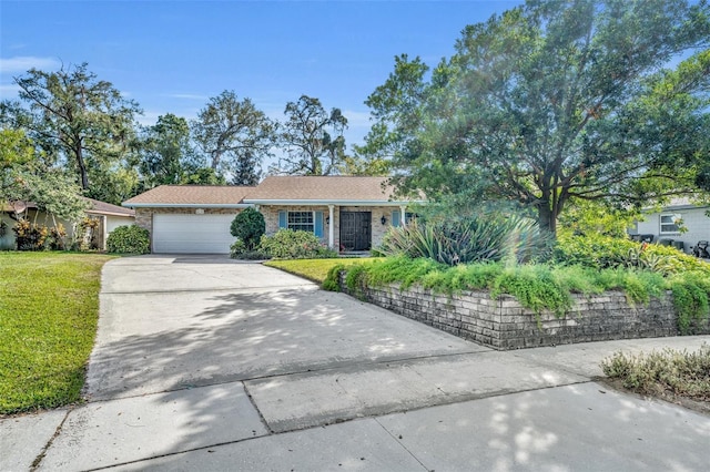 ranch-style house with a garage and a front yard