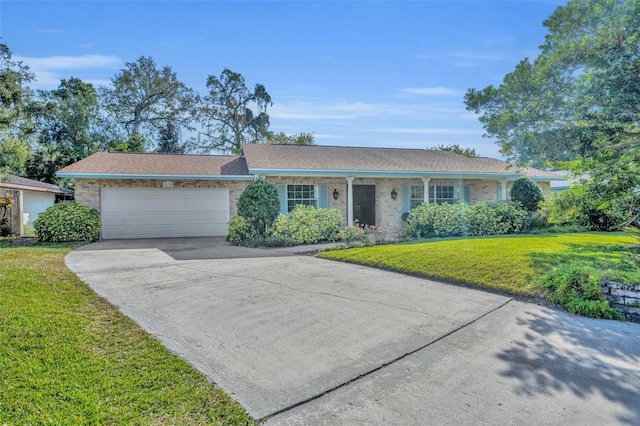 ranch-style house featuring a garage and a front yard