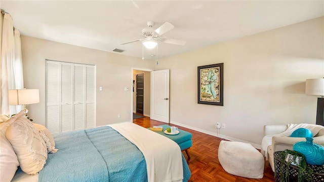 105 17th Ave NE, Saint Petersburg, FL 33704 - bedroom with baseboards, visible vents, a closet, and ceiling fan
