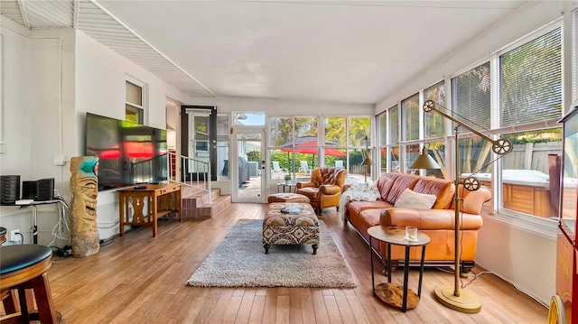 105 17th Ave NE, Saint Petersburg, FL 33704 - sunroom featuring a wooden deck and hardwood / wood-style floors