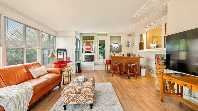 105 17th Ave NE, Saint Petersburg, FL 33704 - living room with a dry bar and wood finished floors