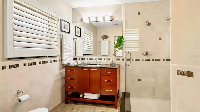 105 17th Ave NE, Saint Petersburg, FL 33704 - bathroom with tile walls, vanity, and a stall shower