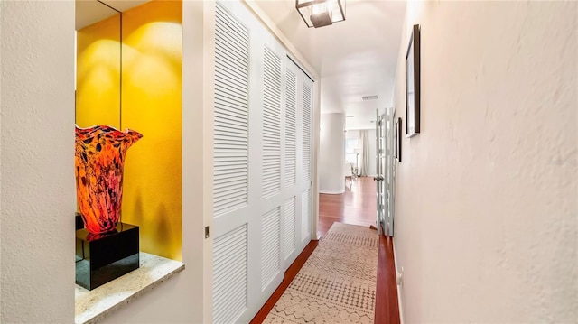 105 17th Ave NE, Saint Petersburg, FL 33704 - hallway with wood finished floors and visible vents