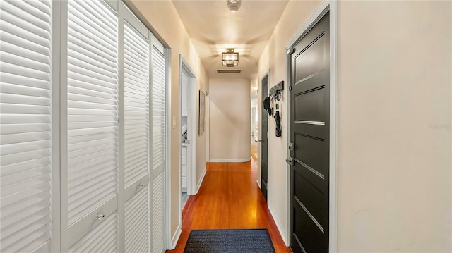 105 17th Ave NE, Saint Petersburg, FL 33704 - corridor featuring wood finished floors and baseboards