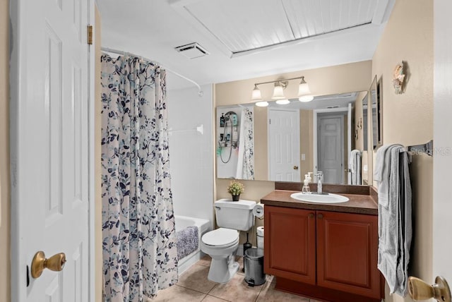 full bathroom featuring vanity, tile patterned flooring, shower / bath combo, and toilet