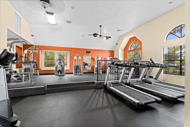 workout area with ceiling fan and lofted ceiling