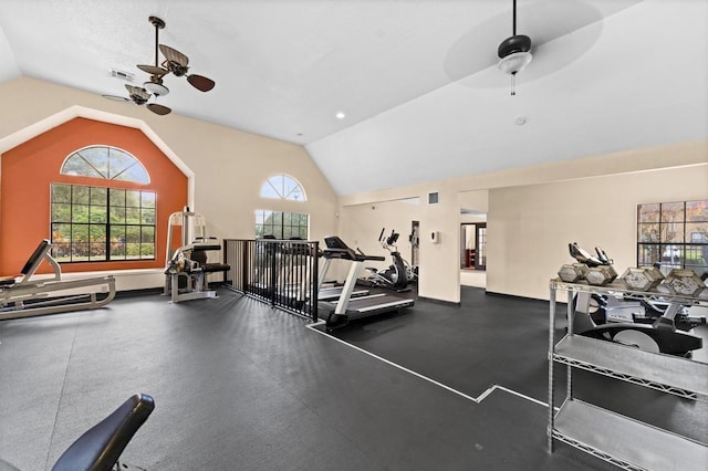 workout area featuring vaulted ceiling and ceiling fan