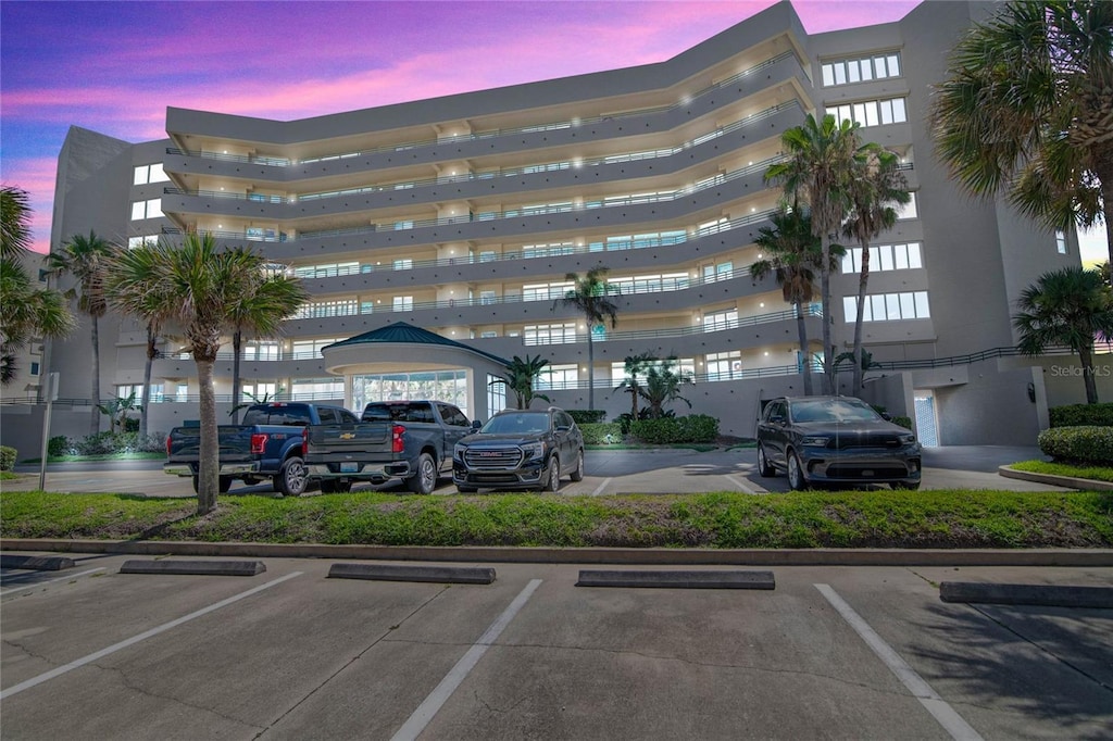 view of outdoor building at dusk