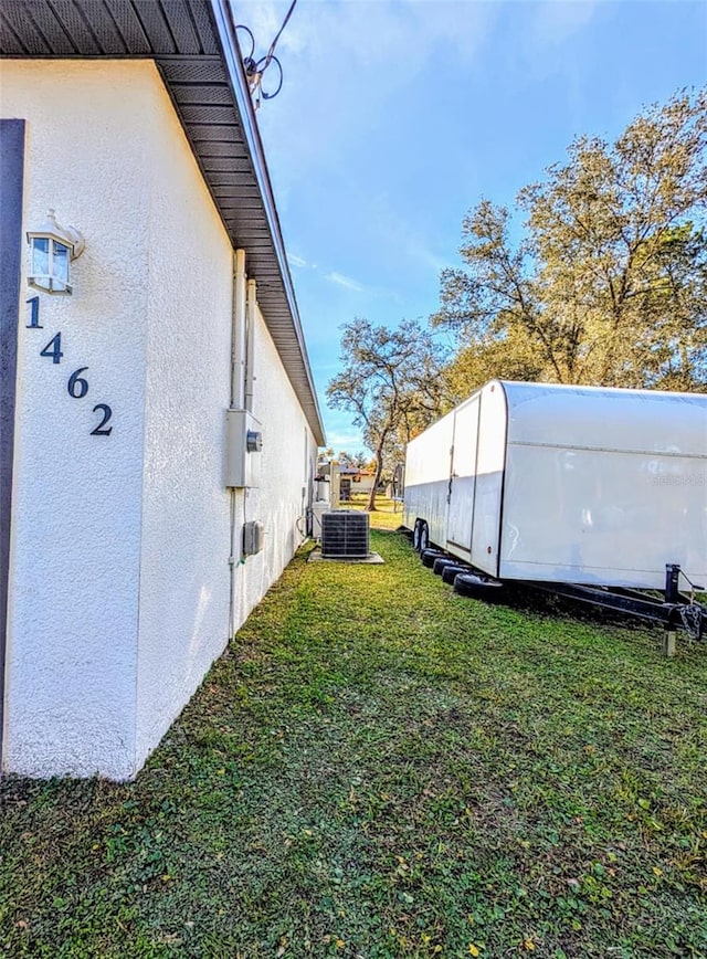 view of yard with cooling unit