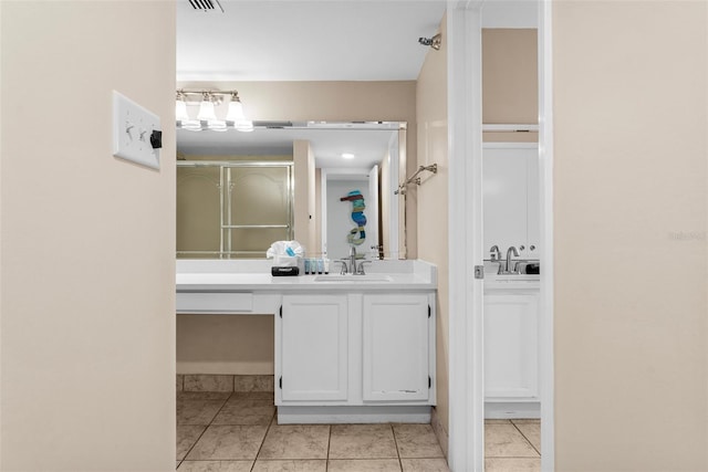 3655 Scenic Highway 98 Unit 503B, Destin, FL 32541 - full bath featuring tile patterned floors, vanity, and an enclosed shower