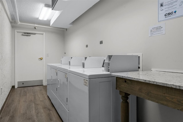 3655 Scenic Highway 98 Unit 503B, Destin, FL 32541 - communal laundry room with dark wood-style floors and washing machine and clothes dryer