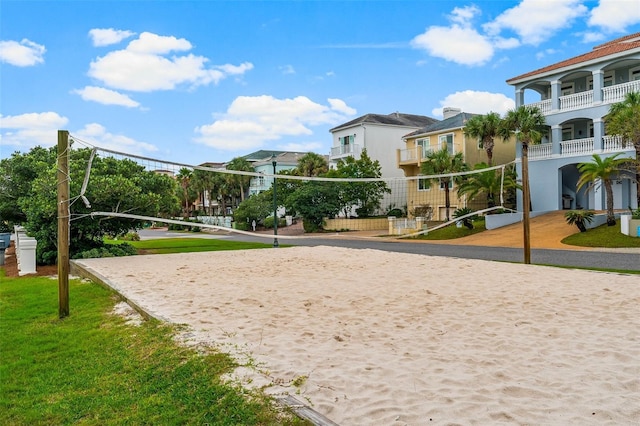 3655 Scenic Highway 98 Unit 503B, Destin, FL 32541 - view of community featuring volleyball court, a residential view, and a lawn