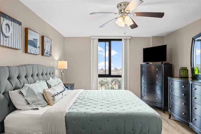 3655 Scenic Highway 98 Unit 503B, Destin, FL 32541 - bedroom with light wood-style floors and ceiling fan