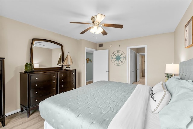 3655 Scenic Highway 98 Unit 503B, Destin, FL 32541 - bedroom featuring light wood-style floors, ceiling fan, and baseboards