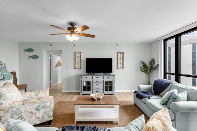 3655 Scenic Highway 98 Unit 503B, Destin, FL 32541 - living room with wood finished floors, ceiling fan, and baseboards