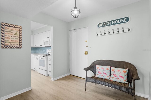 3655 Scenic Highway 98 Unit 503B, Destin, FL 32541 - sitting room featuring light wood finished floors and baseboards