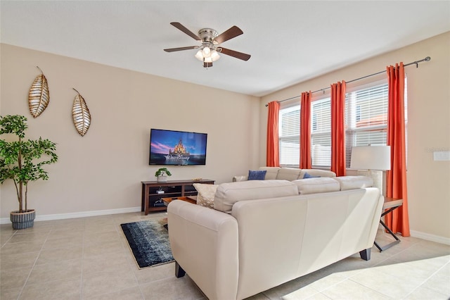 tiled living room featuring ceiling fan