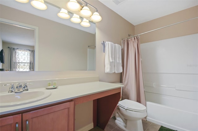 full bathroom with tile patterned floors, vanity, toilet, and shower / tub combo