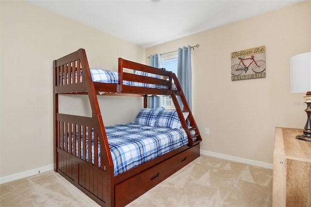 bedroom with light carpet