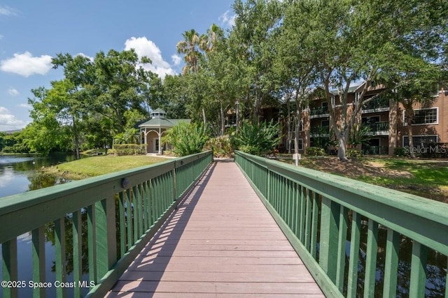 view of community featuring a gazebo and a water view