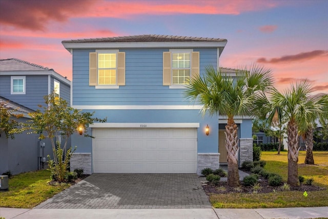 view of front of home featuring a garage