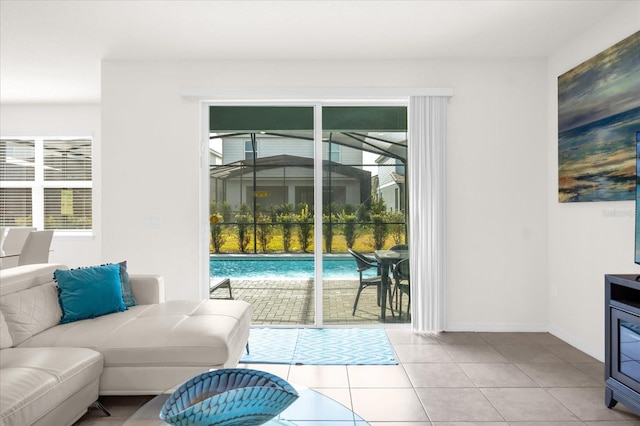 doorway featuring light tile patterned flooring