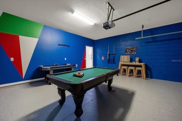 rec room featuring billiards and a textured ceiling