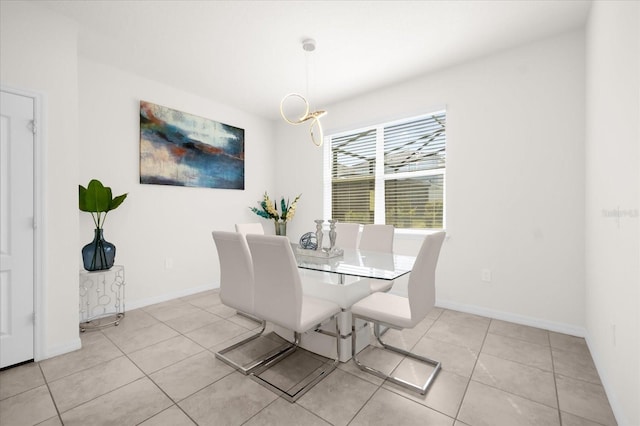 dining area featuring light tile patterned floors