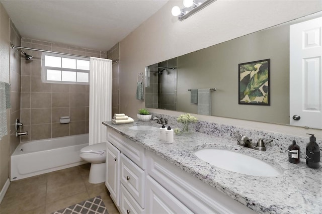 full bathroom featuring tile patterned floors, vanity, toilet, and shower / bath combination with curtain