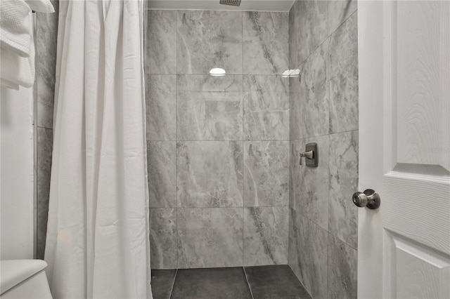 bathroom featuring walk in shower