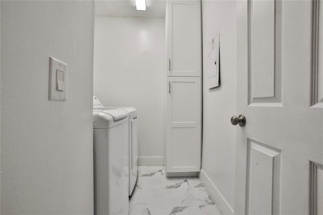 laundry area with cabinets and washer and dryer