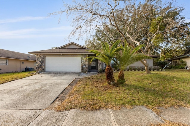 ranch-style home featuring a garage and a front lawn