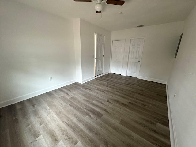 spare room featuring ceiling fan and wood-type flooring