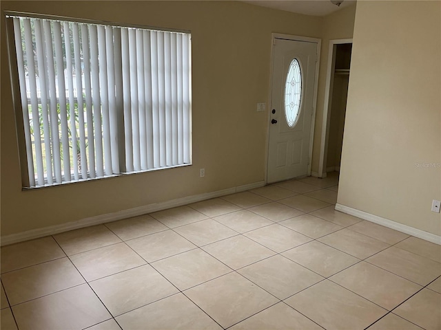 entryway featuring light tile patterned floors