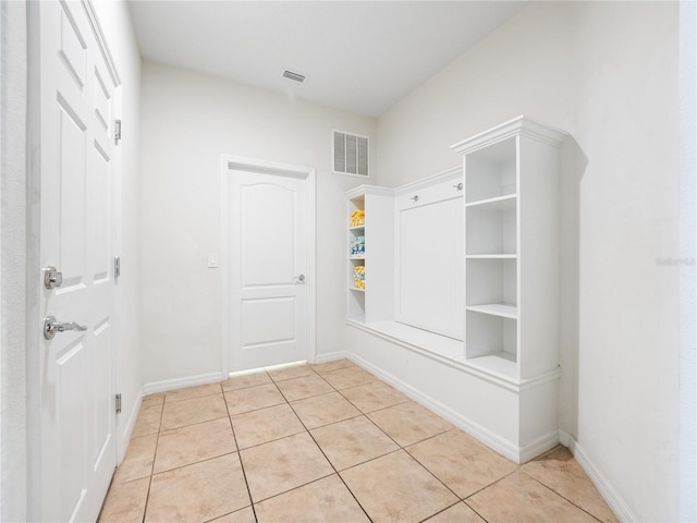 mudroom featuring light tile patterned floors